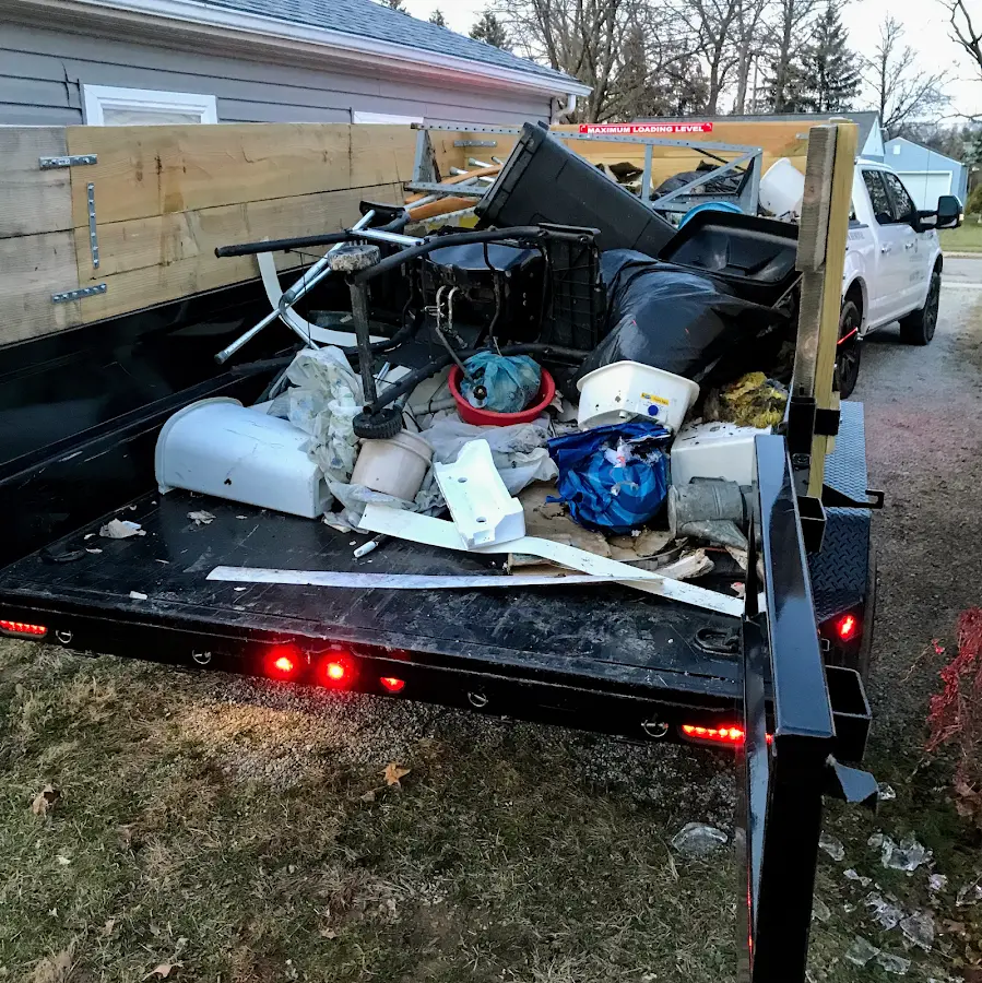 Roll-off dumpster delivered to a residential driveway in Addison